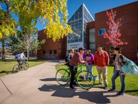 NAU students talking in a group outside the University Union.